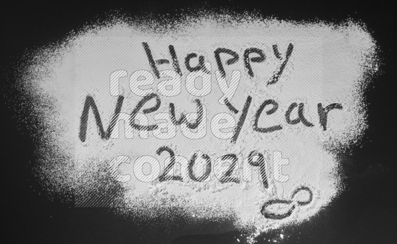 A sentence written with powder on black background