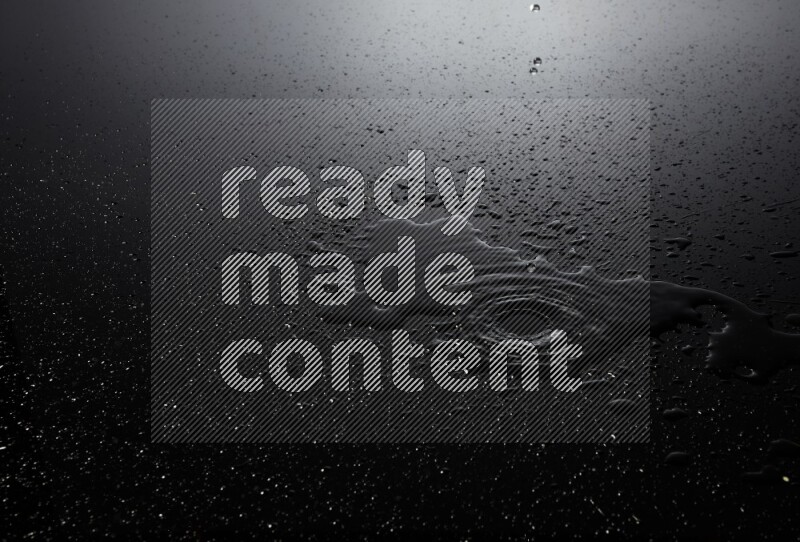 water drops, and droplets on black background