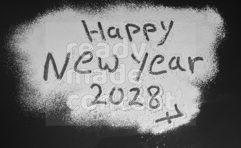 A sentence written with powder on black background