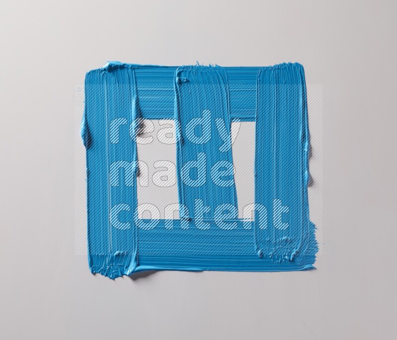 Multi blue straight brush strokes in different shapes on a white background