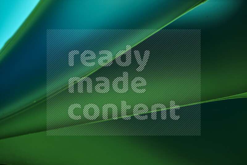 An abstract art piece displaying smooth curves in cold gradients created by colored light