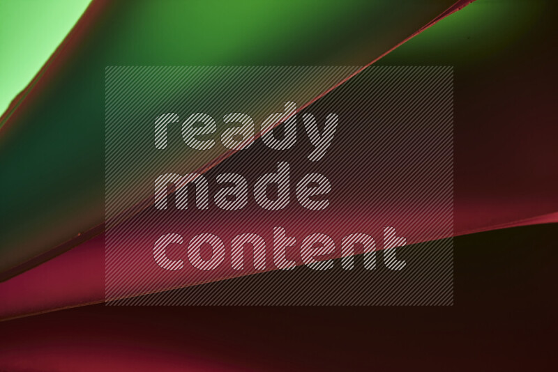 فن تجريدي يعرض منحنيات مع تدرجات الألوان الدافئة والباردة مكونه بضوء ملون