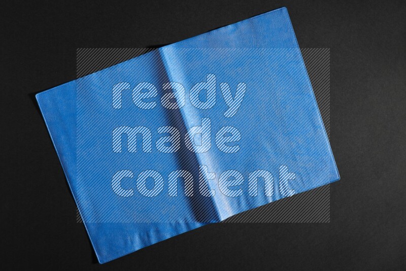 Colored plastic textures on black background